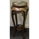 An early 20th Century mother of pearl inlaid jardiniere stand,