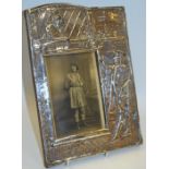 A large silver photograph frame, embossed with a scene from Romeo and Juliet, Charles .