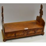 An early 20th century Neo-Gothic hardwood book stand,