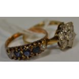 A 9ct gold five stone sapphire and diamond ring, claw set,