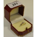 A diamond solitaire ring, approx 1/18 carat, silver shank,