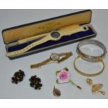 A 9ct gold lady's Rotary 21 jewels wrist watch, Rotary box (13g); a silver link bracelet,