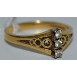 A brilliant cut diamond three stone ring, 18ct gold shank, 4.