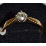 A lady's diamond solitaire ring, gold shank 1.