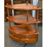 A 19th century burr walnut whatnot, barley twist supports, the base enclosing four short drawers,