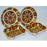 A pair of Royal Crown Derby 1128 shaped rectangular trinket dishes;