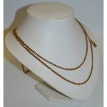 A 9ct gold chain link muff chain, 156cm long,