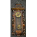 A Victorian mahogany drop pendulum wall clock