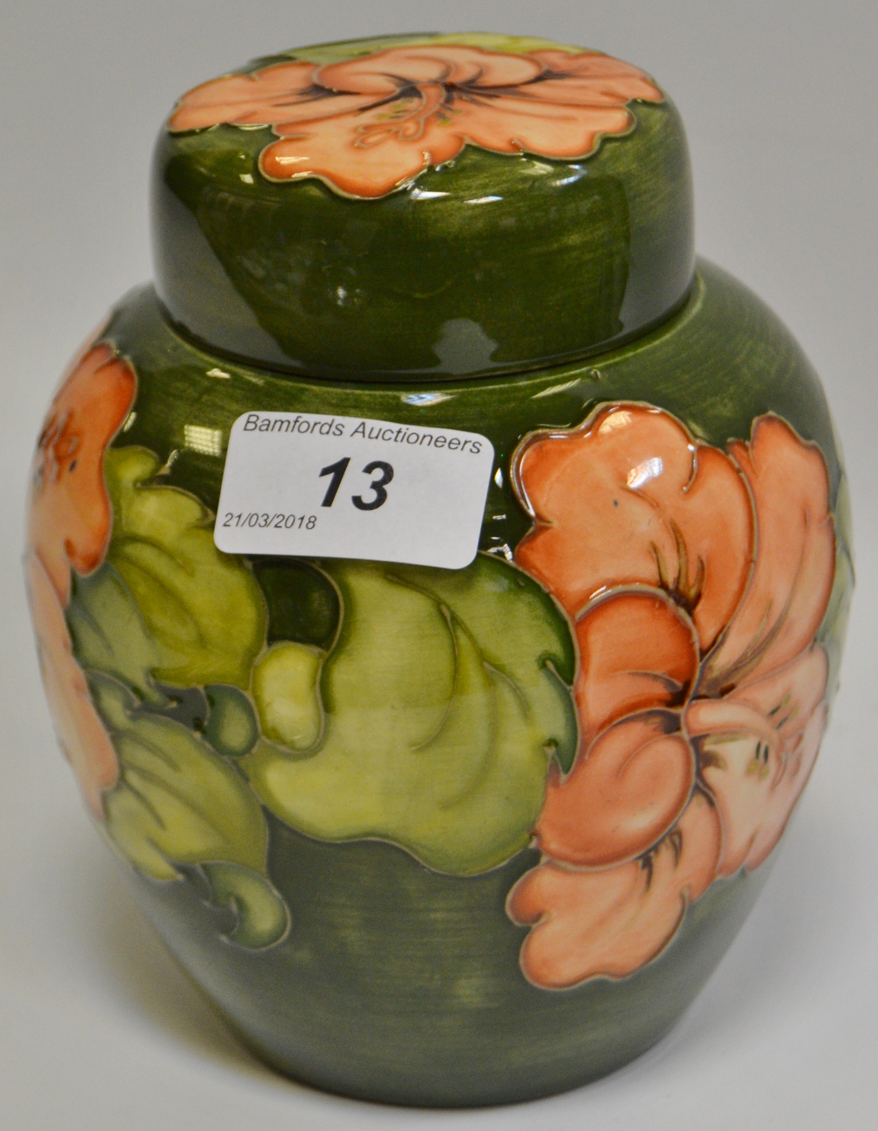 A Moorcroft Hibiscus pattern ginger jar and cover,