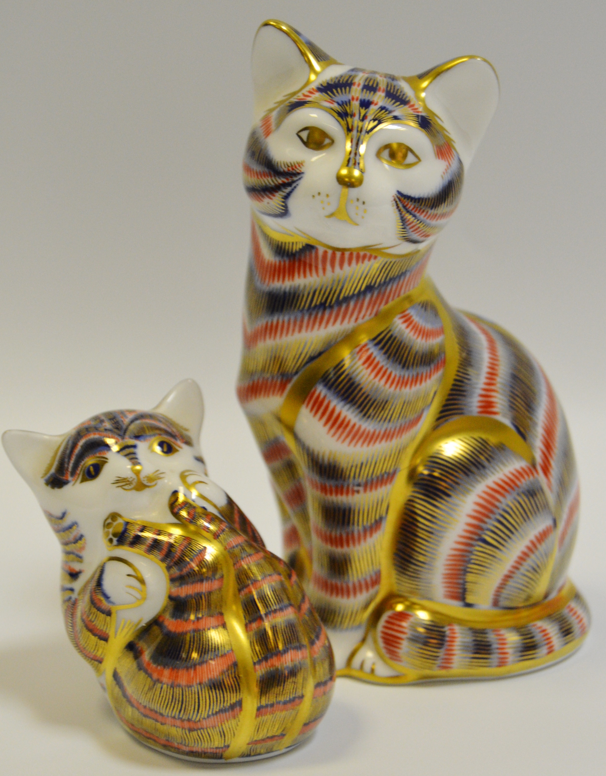 A Royal Crown Derby Majestic Cat; another Kitten,