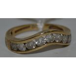 A nine stone diamond ring, 9ct gold shank 2.