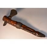 Tribal Art - an African axe, probably Yoruba, the bone shaft carved as a stylised figure,