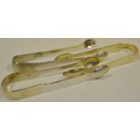 Silver - a pair of George III silver sugar tongs, London 1805; others, London 1834,