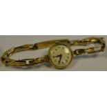 A Rolex Tudor 9ct gold ladies watch, original 9ct gold expanding bracelet, white face,