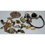 A micro mosaic oval brooch decorated with flowerheads; a Jet faceted pendant; cufflinks;