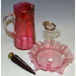 Glass - a Victorian ruby tapering spiralled scent flask; a silver rimmed cream jug,