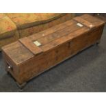 An early 20th Century pitch pine military chest, hinged top, baring owners name on label,