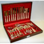 A canteen of Arthur Price cutlery for eight placings in bead pattern presented in an oak case