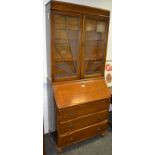 An early 20th Century oak bureau bookcase,