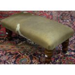 A Cow hide footstool,