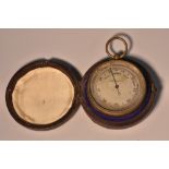 A 19th century brass pocket barometer, 4.5cm silvered register, 7cm over loop, morocco case, c.