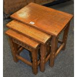 A North Country oak nest of egg and dart fluted occasional tables