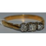 An 18ct gold trilogy diamond ring, stamped 18ct (2.