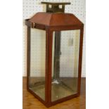 A contemporary leather cased lantern