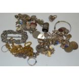 A silver buckle ring; a silver and marcasite heart shaped ring; silver chain; 2 silver thimbles;