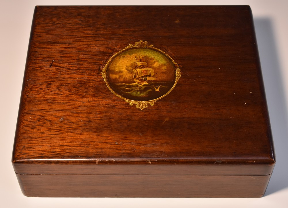 An early 20th century mahogany and 'vernis martin' table cigarette box,