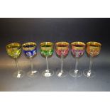 A set of six Moser flashed multi coloured hock glasses with gilt rims