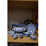 A Wedgwood blue Jasperware pedestal bowl; others similar including cylindrical vase,