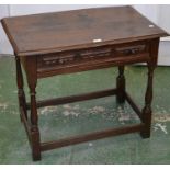 A 19th century oak side table, rectangular top, single drawer to frieze, turned legs.