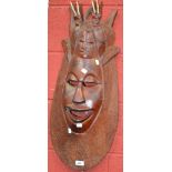 Tribal Art - an African carved hardwood mask,