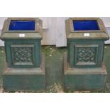 A pair of 20th century cast iron planters,