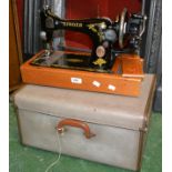 A hand powered Singer sewing machine,