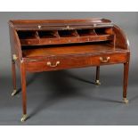 A George III mahogany tambour front cylinder desk, of large proportions,