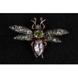 A diamond, peridot, ruby and pale pink amethyst insect brooch, pale pink amethyst abdomen,