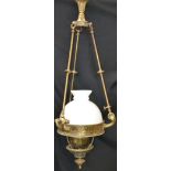 A substantial early 20th century lacquered brass ceiling lamp, pierced anthemion friezes,