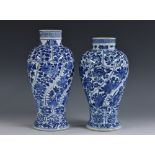 A Chinese blue and white inverted baluster lobed vase, painted with panels of scrolling flowers,