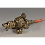 A Victorian teething whistler rattle,bulbous body, five suspension bells, allover floral decoration,