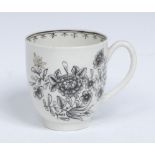 A rare Worcester coffee cup, pencilled in black with oriental flower sprays,
