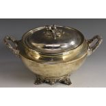 A George IV silver tureen, domed cover with acorn finial, acanthus grasped handles, shell feet,