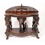 A 19th century Burmese sideboard, profusely carved throughout,