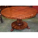 A George III/William IV mahogany circular centre table, well figured top above a deep frieze,