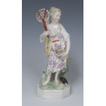 A Derby Patch Mark figure, Allegorical of Water, she stands holding a net,