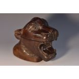 A 19th century mahogany table snuff box, carved as a ferocious tiger, hinged cover, 14.