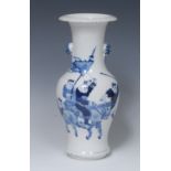 A Chinese blue and white baluster vase, painted with figures on foot and horseback, everted rim,