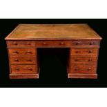 A Victorian mahogany twin pedestal rounded rectangular partners desk,