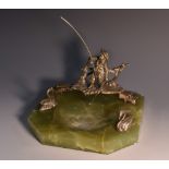 A late 19th/early 20th century silvered bronze and green onyx canted desk tidy,